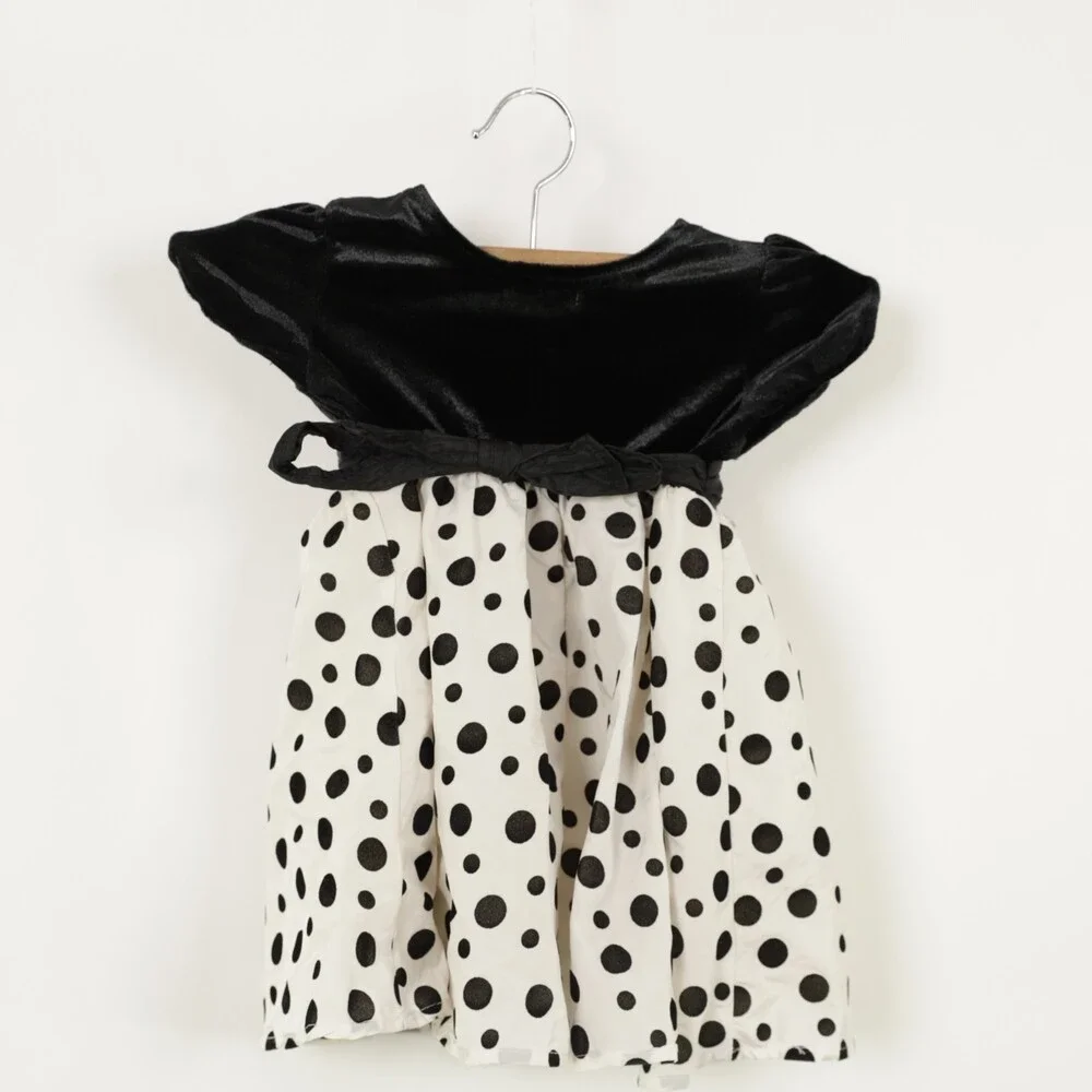 Place Baby Polka Dot Dress with roses at waistline size 12 mos